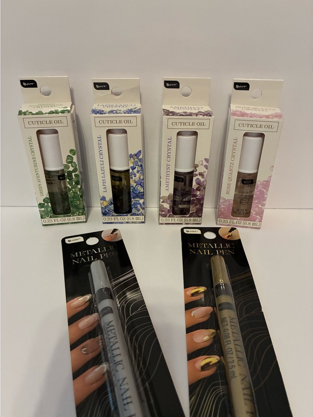 b.Pure Crystals Cuticle Oil & Metallic Nail pens  bundle